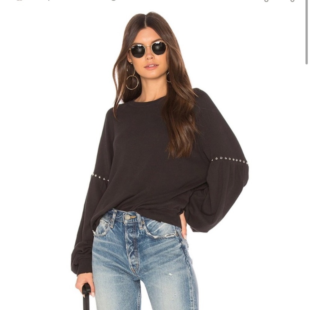 The Great. Beautiful black sweatshirt size 2 fits like a medium